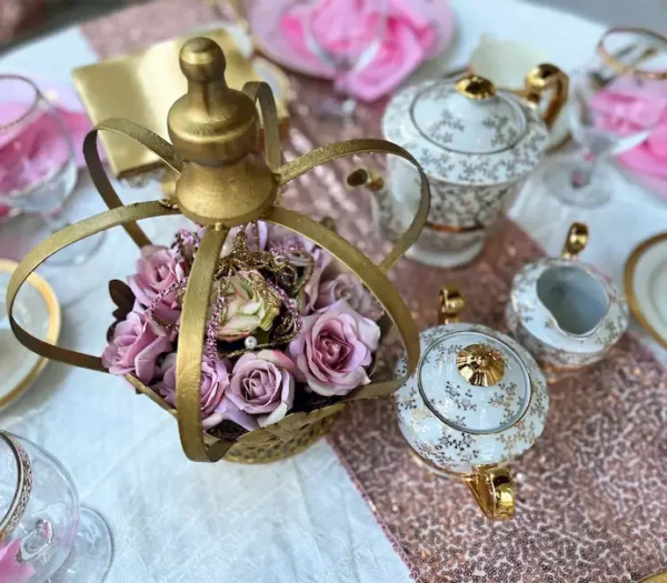 princess theme party - The Tea Party Company gold-crown-centerpiece-roses-teacups