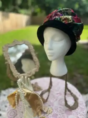 Vintage hat in a white head manequin