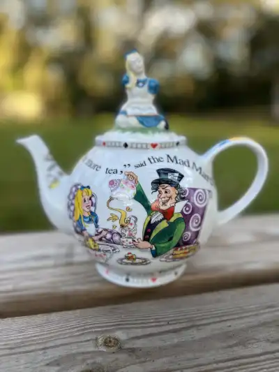 alice in wonderland theme party | The Tea Party Company Alice in Wonderland Teapot with Alice Figure Lid Design By Paul Cardew.