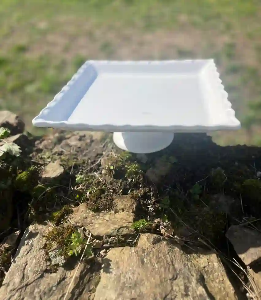 white square ceramic cake stand