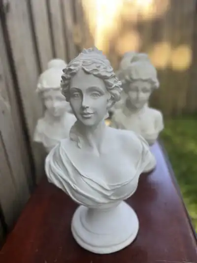 bridgerton & downton abby theme party | The Tea Party Company female torso statues plaster white sitting on a wood surface