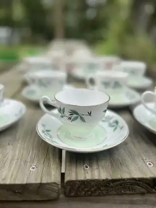 matching-tea-cups-and-saucers | The Tea Party Company pale green and white teacups and saucers