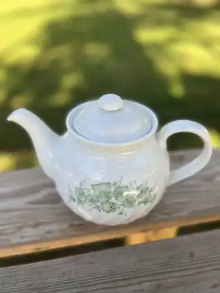 mismatch tea pots rentals | The Tea Party Company white teapot green ivy leaf pattern