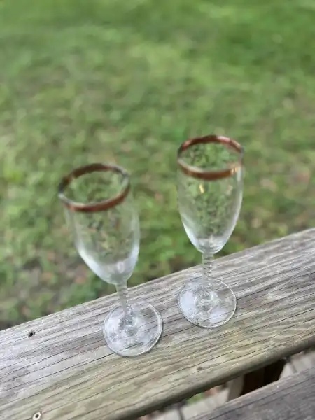glassware rentals | The Tea Party Company clear glass flutes silver rim