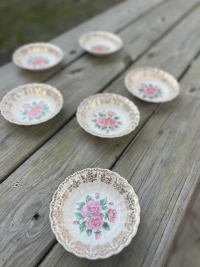 matching china rentals | The Tea Party Company 6 cream and gold vintage bowls sitting on a table.