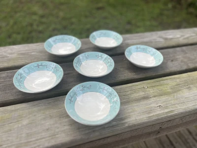 matching china rentals | The Tea Party Company 6 white and blue vintage bowls sitting on a table.