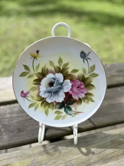 salad plates rentals | The Tea Party Company Vintage salad plate with colorful flowers all over the plate.