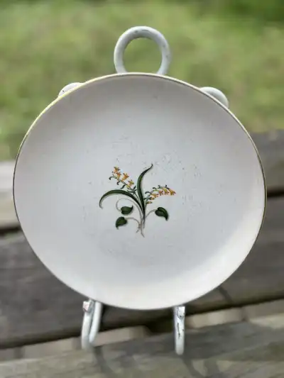 salad plates rentals | The Tea Party Company Vintage 7 inch plate cream with w wheat branch in the middle.