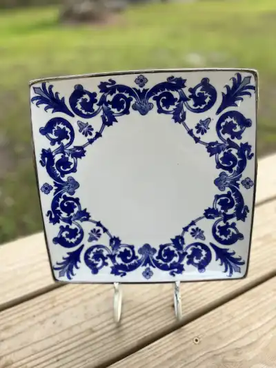 dinner plates rentals | The Tea Party Company Square dinner plate white with a blue cobalt scroll design on the border.
