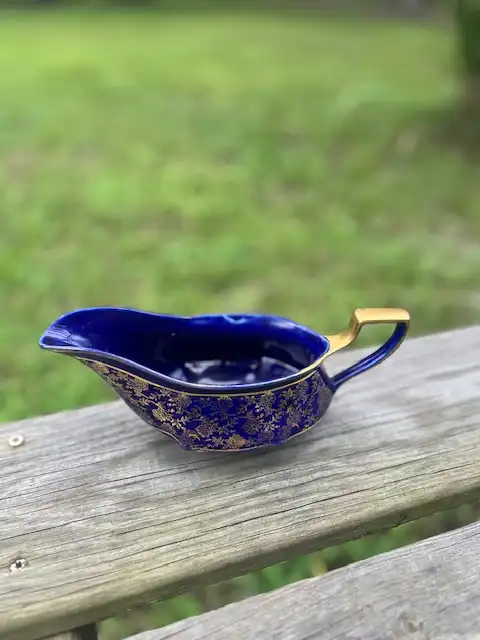 mismatch china rentals | The Tea Party Company Navy gold vintage gravy bowl.
