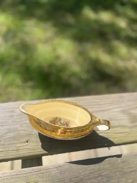 mismatch china rentals | The Tea Party Company Stunning vintage gold rim cream color gravy bowl.