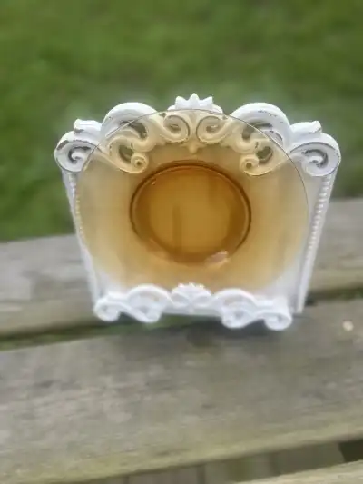 salad plates rentals | The Tea Party Company Amber Glass Salad Plate Standing on a Wood Base.
