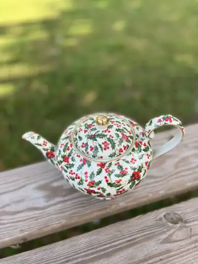 mismatch tea pots rentals | The Tea Party Company White Christmas Teapot with red flowers and green leafs,