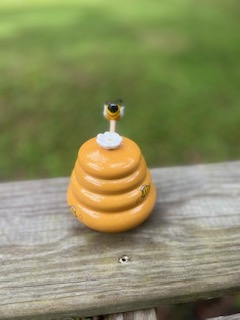 tea party rentals | The Tea Party Company yellow ceramic honey holder with a bee on top