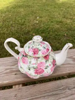 mismatch tea pots rentals | The Tea Party Company pink flowers shabby chic style tea pot