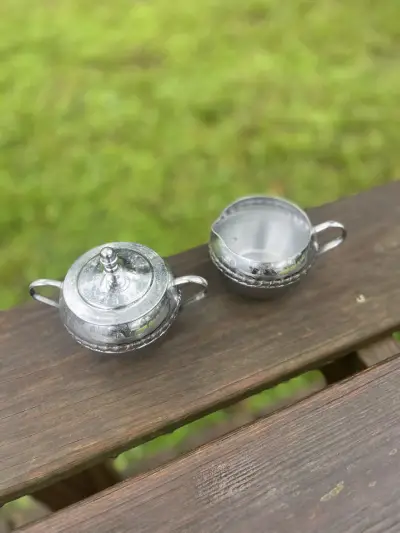 silver plated rentals | The Tea Party Company Mid Century Chrome Sugar Bowl and Creamer by Irvinware.