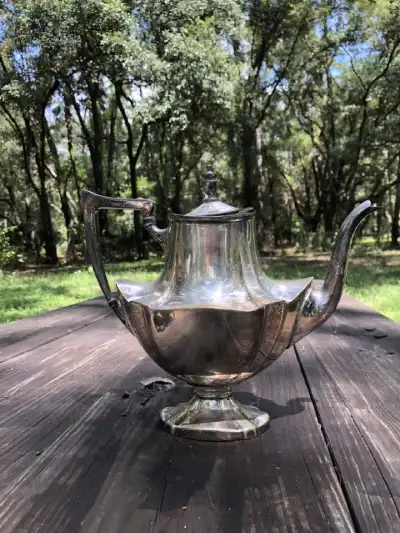 silver plated rentals | The Tea Party Company Silverr Tea Pot On Top of a Table.