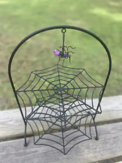 food stands rentals | The Tea Party Company 2 tiere black metal spider web tiered food stand halloween motif with a hanging spider