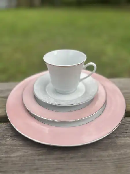 matching-tea-cups-and-saucers | The Tea Party Company white and silver teacup and saucer pionk salad and dinner plates