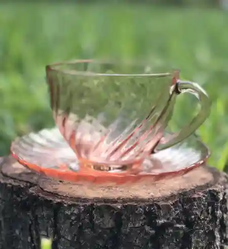 matching-tea-cups-and-saucers | The Tea Party Company pink glass teacup and saucer