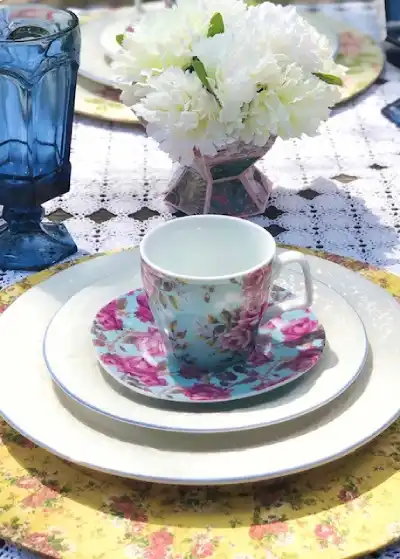 teacup and saucer blue and hot pink