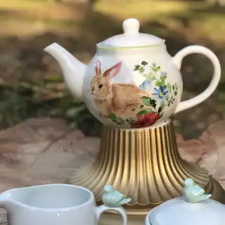 mismatch tea pots rentals | The Tea Party Company white teapot easter rabbit