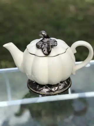 mismatch tea pots rentals | The Tea Party Company white ceramic teapot thanksgiving motif