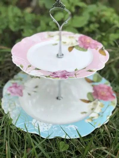 food stands rentals | The Tea Party Company 2 tiered pink and blue shabby chic style food stand with flowers and silver finial