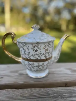 mismatch tea pots rentals | The Tea Party Company white and gold teapot