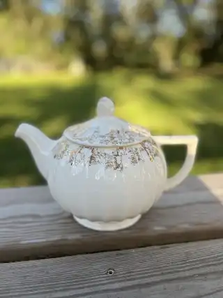 mismatch tea pots rentals | The Tea Party Company off white gilded tea pot