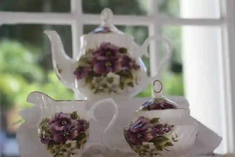 white tea set purple flowers